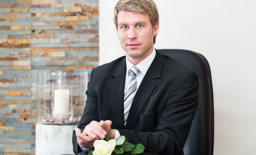 Mortician in his store