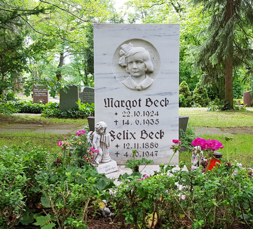 Grabstein Urnengrab - Relief Mädchengesicht