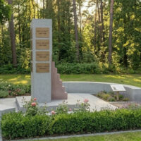 Gemeinschaftsgrab für die Urnenbestattung mit Grabstein und Grabgestaltung